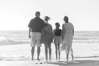 photograph of family on beach eea famiy members