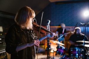 Creative worker visa UK 2025 - musicians rehearsing